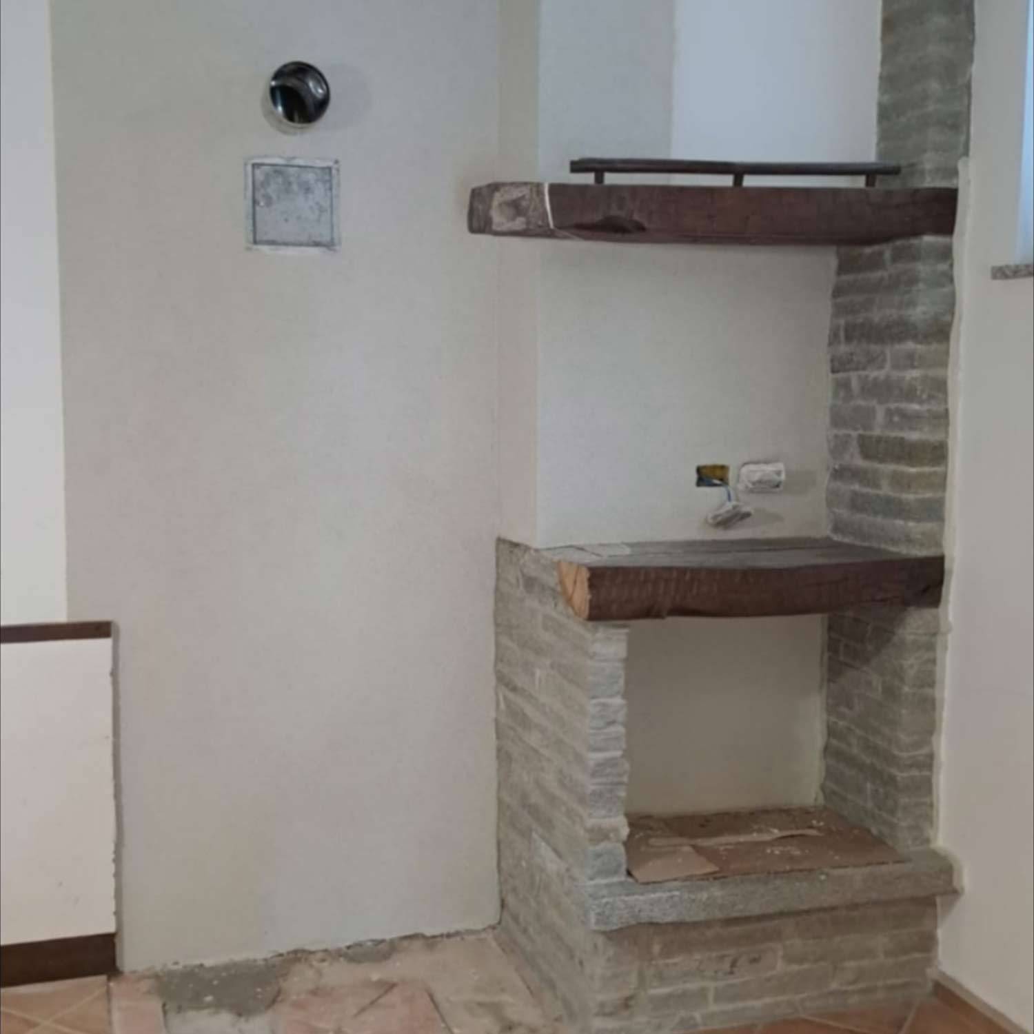 spazzacamino-capra-marco-cantù-installazione-comignolo-rame