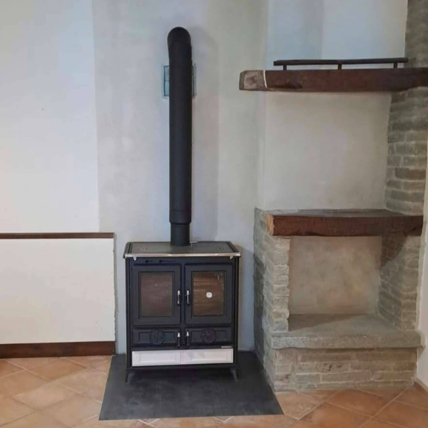 spazzacamino-capra-marco-cant&ugrave;-installazione-comignolo-antivento-rame-tetto-stufa-1